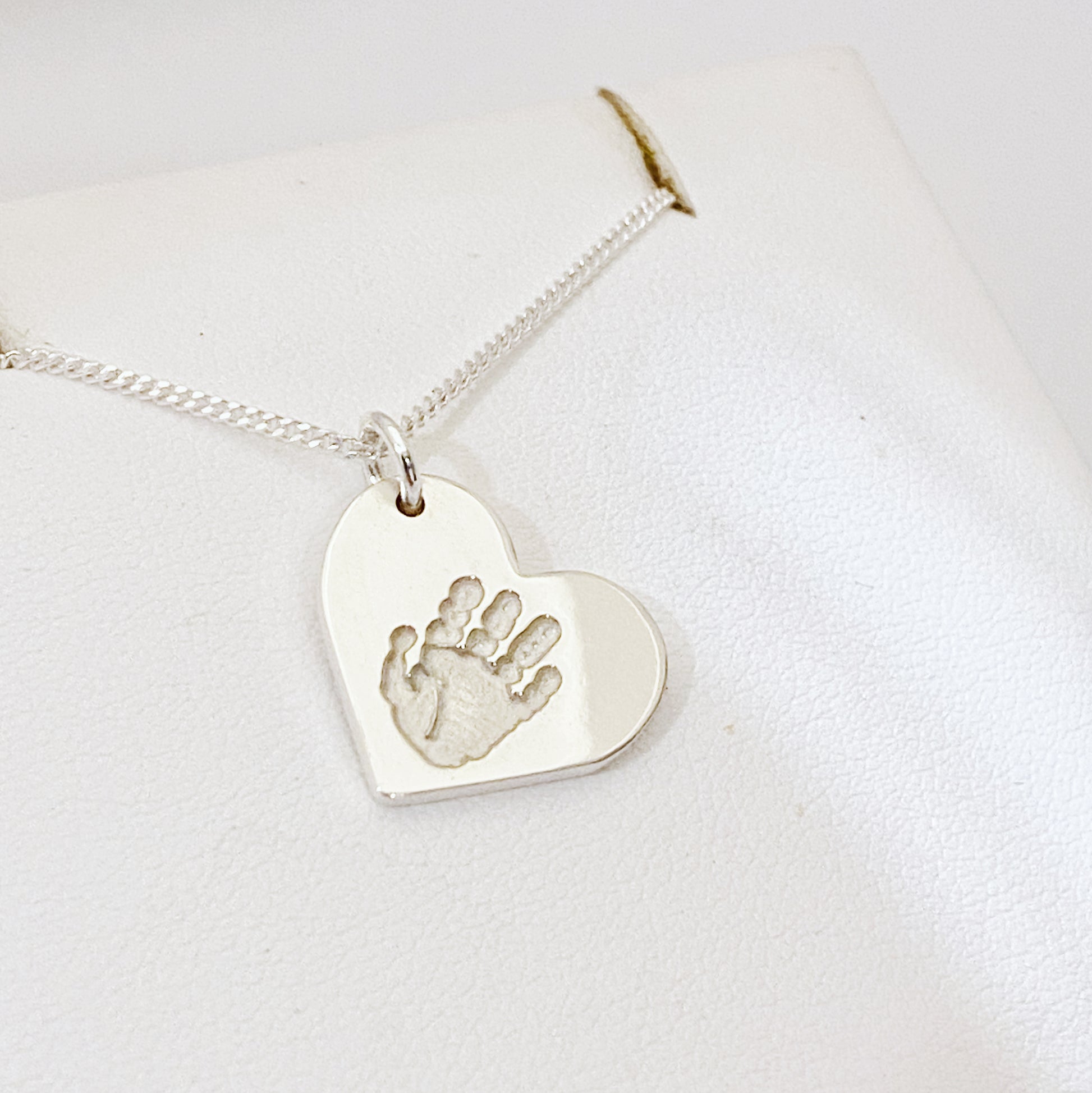 Small modern handprint Jewellery, use your babies, pet or loved ones hand or footprint. Made in New Zealand from sterling Silver
